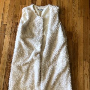 Long white furry vest